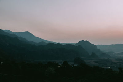 Scenic view of mountains against sky during sunset