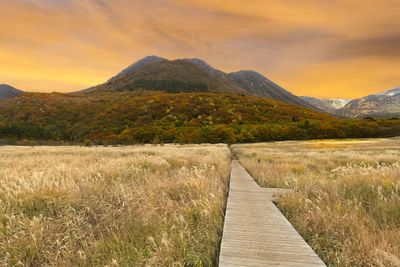 Scenic view of mountains against sky during sunset