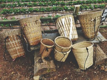 High angle view of wicker basket on field