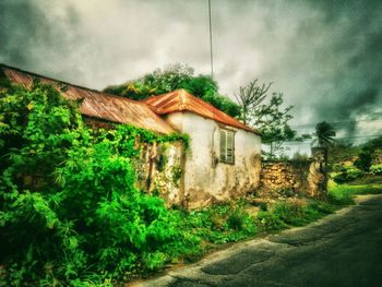 Built structure against cloudy sky