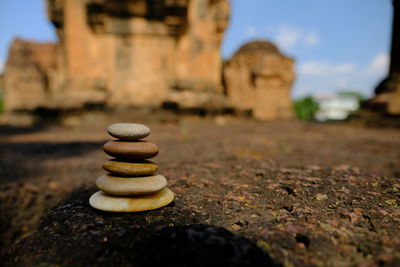 Close-up of stone stack on rock