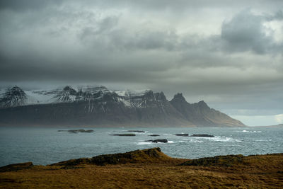 Scenic view of sea against sky during winter