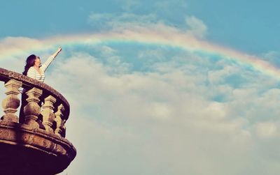 Low angle view of person against sky