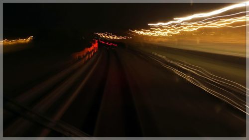 Light trails on road at night