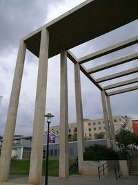 View of built structure against cloudy sky