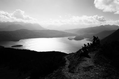 Scenic view of mountains against cloudy sky