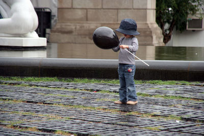 Full length of boy in water