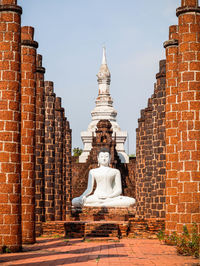 View of statue against building