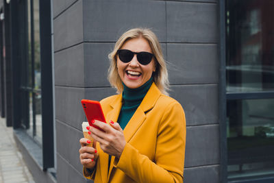 Young woman using mobile phone