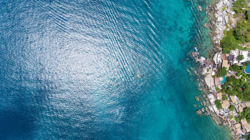 Aerial view of sea by houses