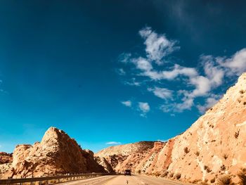 Low angle view of rock formations against sky