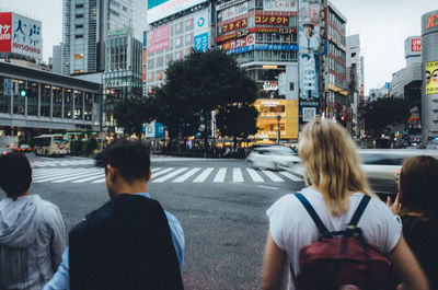 People on street in city during sunset