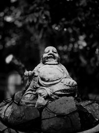 Low angle view of buddha statue