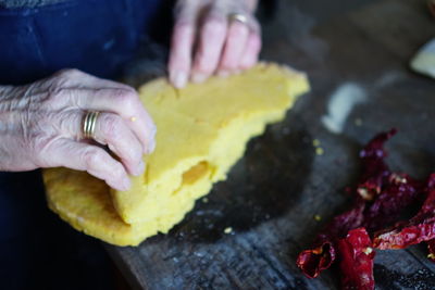 Close-up of person preparing food