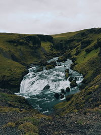 Scenic view of river against sky