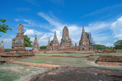 Temple outside building against sky