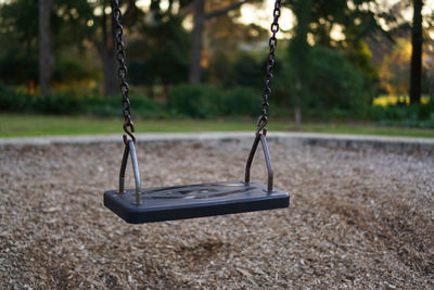 Empty swing in park