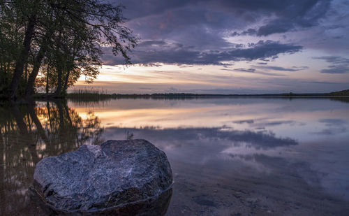 Scenic view of lake against sky during sunset