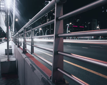 Light trails on road in city at night