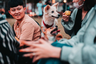 Group of people with dogs