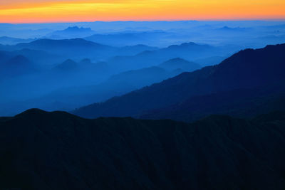 Scenic view of mountains against sky during sunset