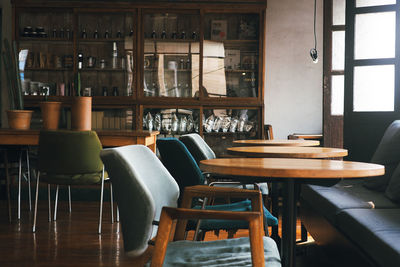 Empty chairs and table in cafe