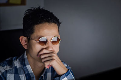 Portrait of young man wearing sunglasses