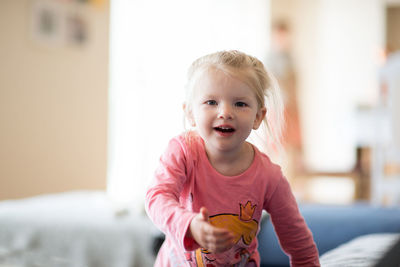 Close-up portrait of smiling girl