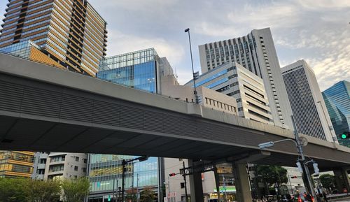 Low angle view of skyscrapers against sky