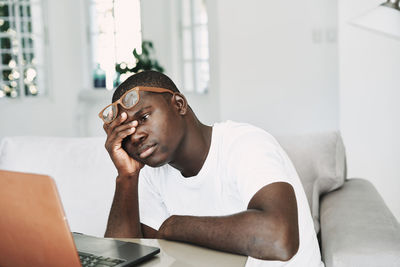 Young man using mobile phone