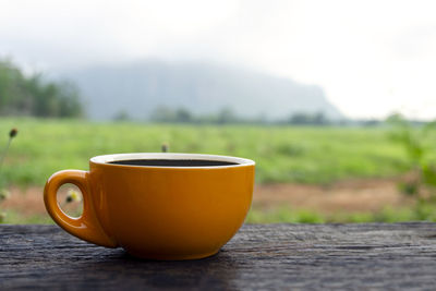 Close-up of coffee cup on table