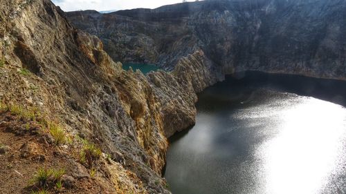 Scenic view of river amidst rocks