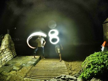 View of illuminated steps at night