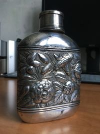 Close-up of glass jar on table