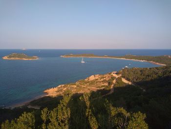 Scenic view of bay against clear sky