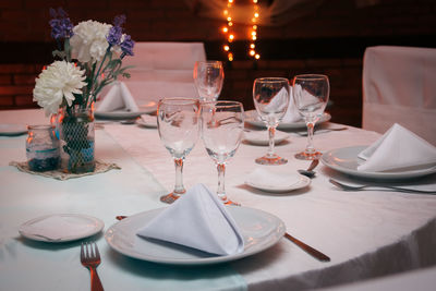 Place setting on table in restaurant