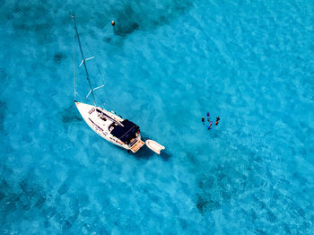 High angle view of sailboat sailing in sea