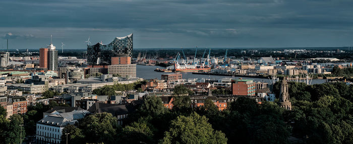 High angle view of buildings in city against sky