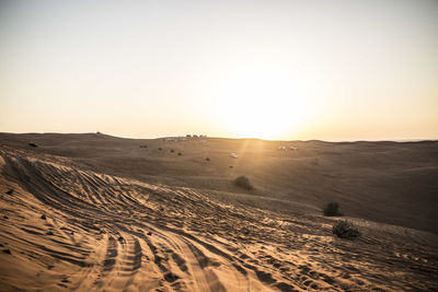 Scenic view of landscape against sky during sunset