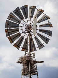 View of traditional windmill against sky, kruger national park, south africa