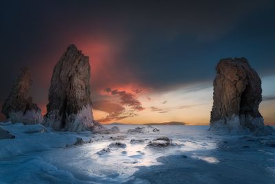 Scenic view of sea against sky during winter