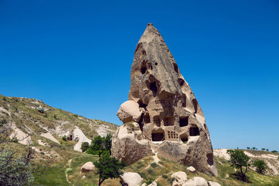 Old town of uchisar in turkey houses and the fortress in the summer in sunny weather