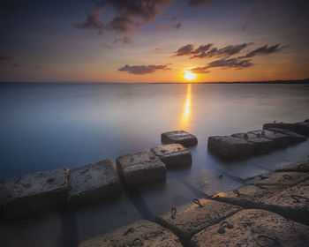 Scenic view of sea against sky during sunset