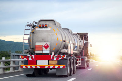 Trucks transporting dangerous chemical on the road, industrial transport