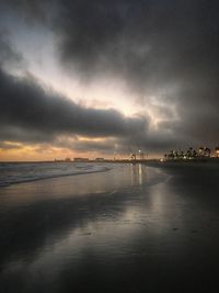 Scenic view of sea against cloudy sky