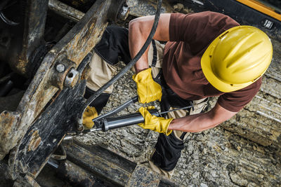 High angle view of person working on table