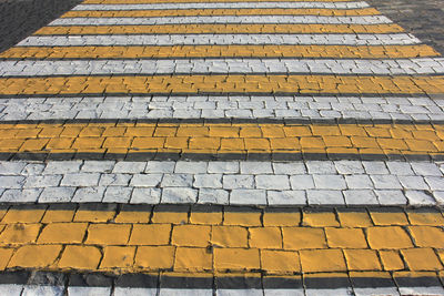 High angle view of yellow marking on street