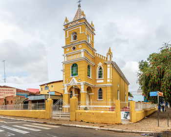 View of yellow building against sky