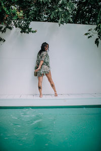 Full length of woman in swimming pool