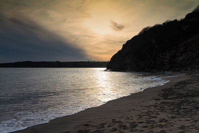 Scenic view of sea against sky during sunset